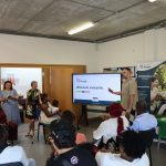 Special People team members and attendees gather for a presentation during the Open Day.